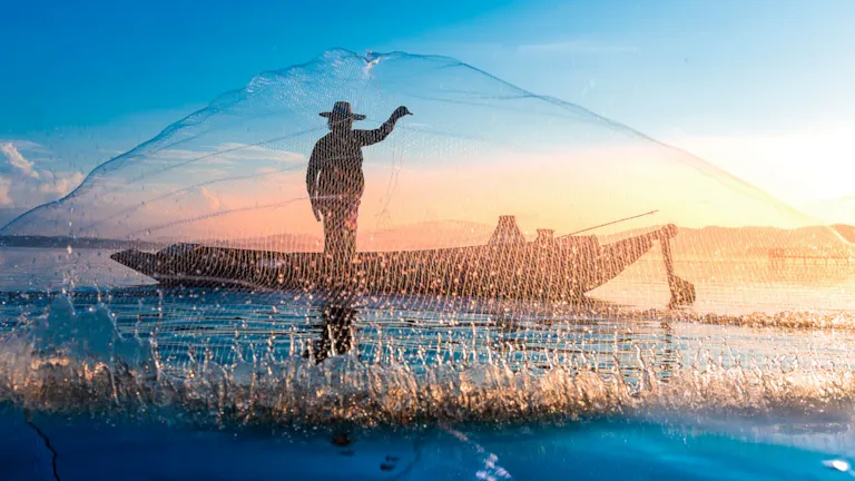 Fisherman casting net