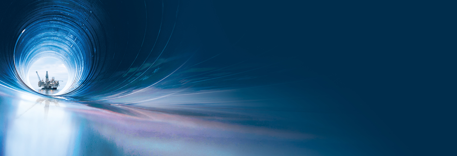 Oil rig seen through a pipeline