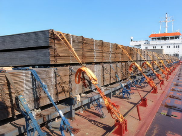 Steel plates - well secured with a combination of lashing chains, lashing straps and appropriate fittings.