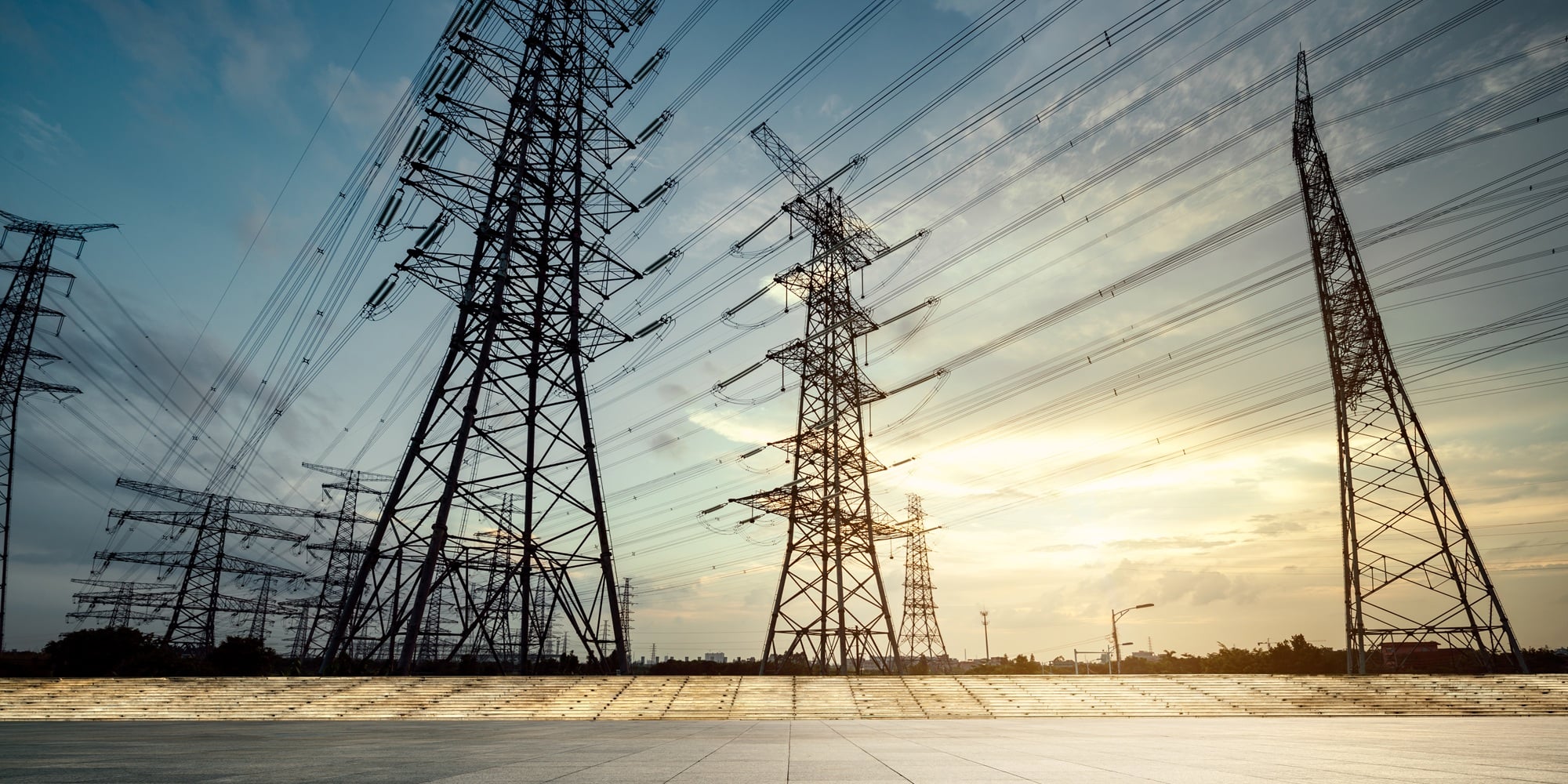 High voltage towers in the dusk of the evening