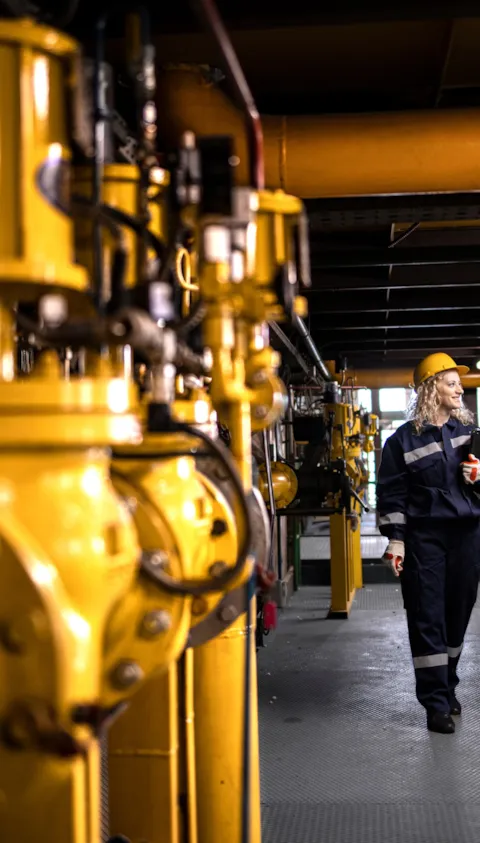 two machinery workers