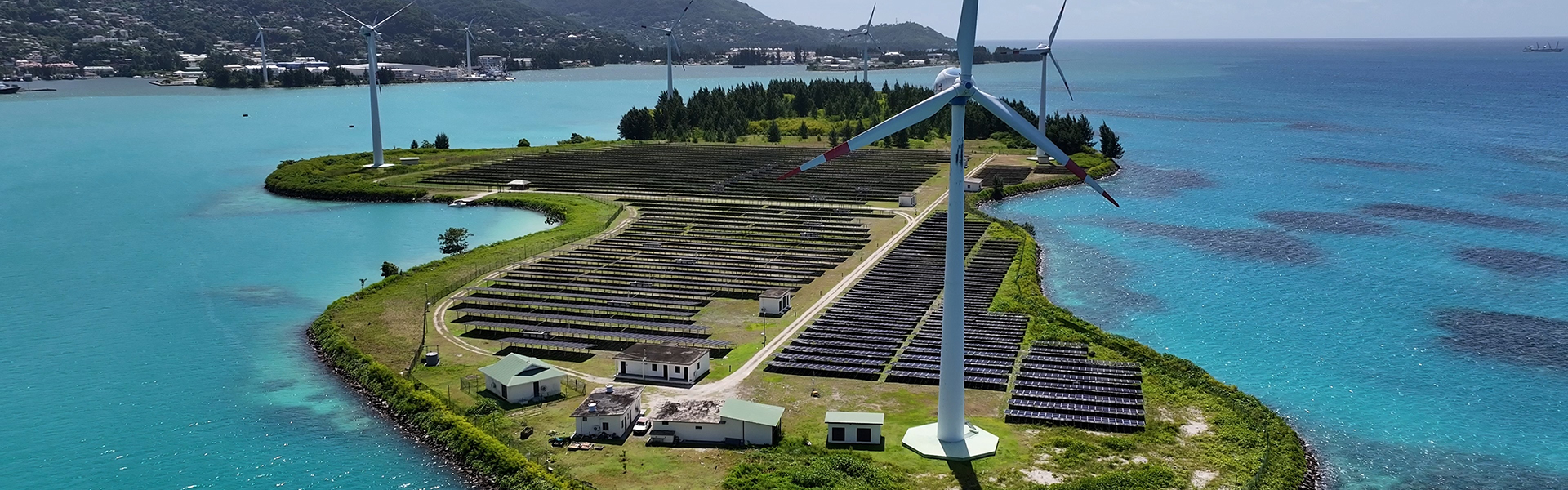 Solar panels and wind turbines on a small island