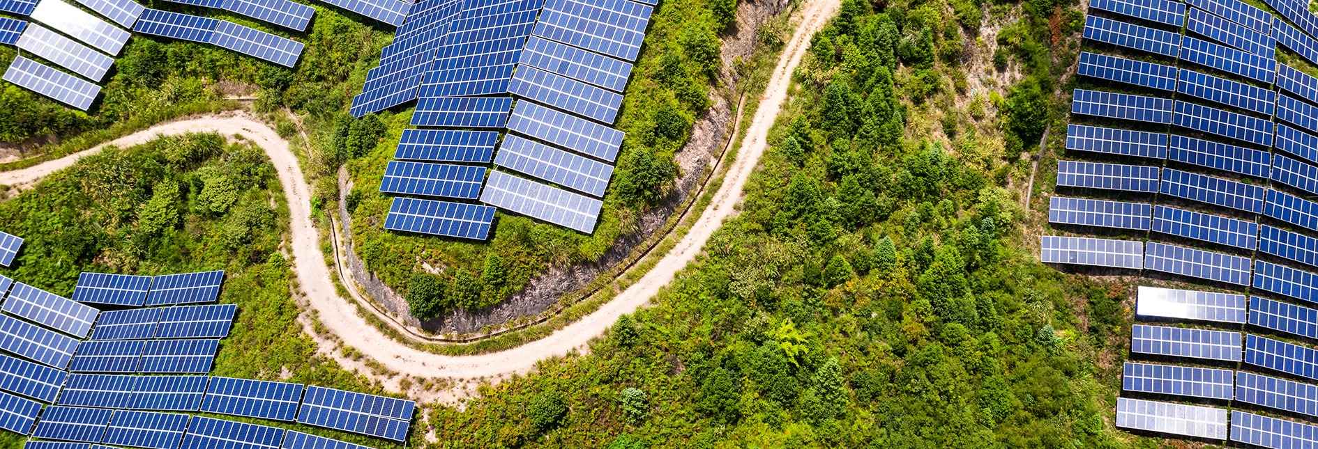 Aerial view of solar panels in mountains