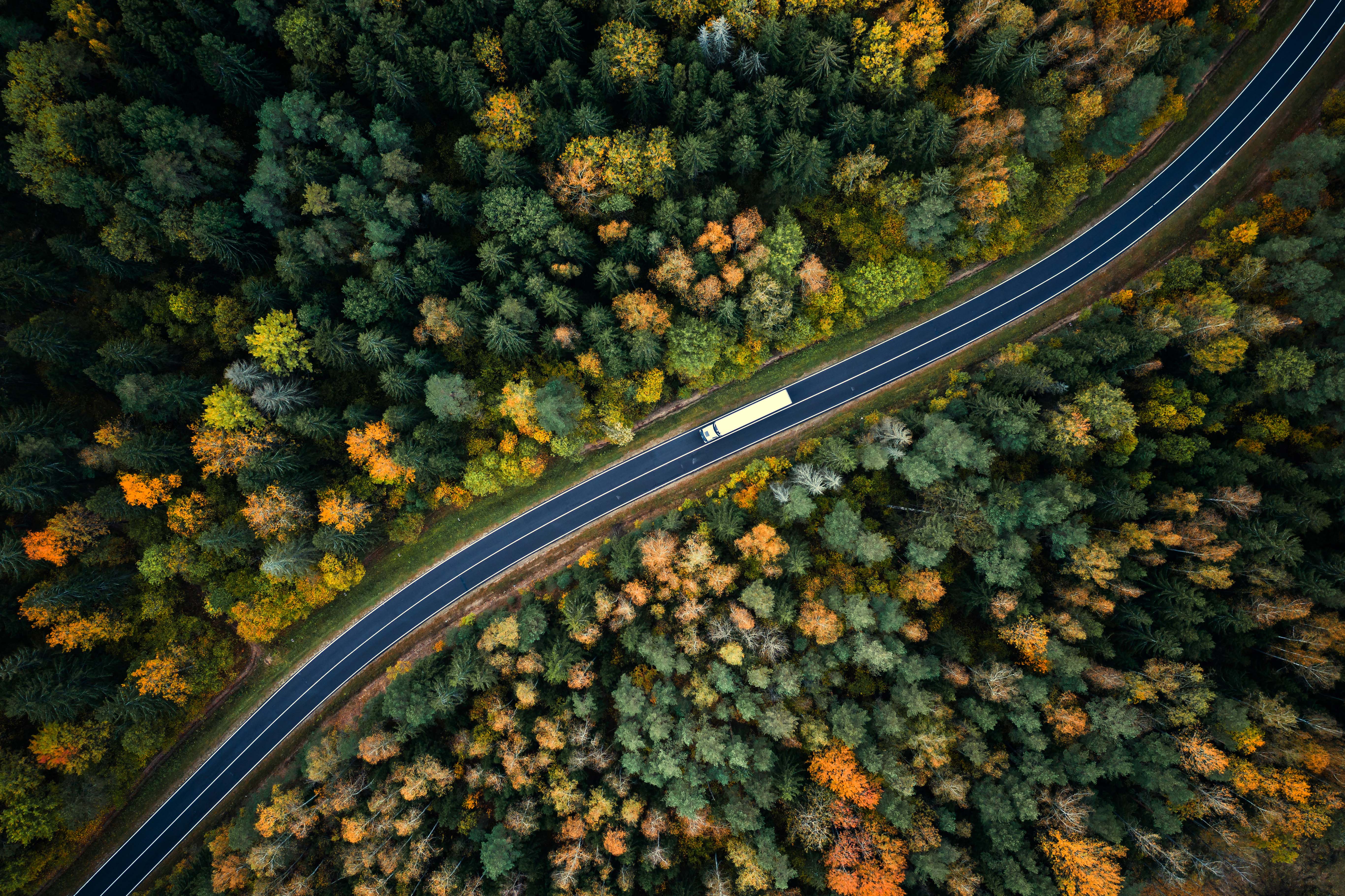 Aerial view of heavy truck on a twisting road