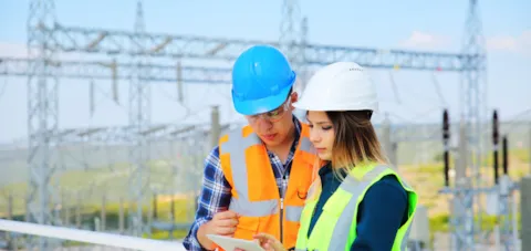 electric cables with two grid workers