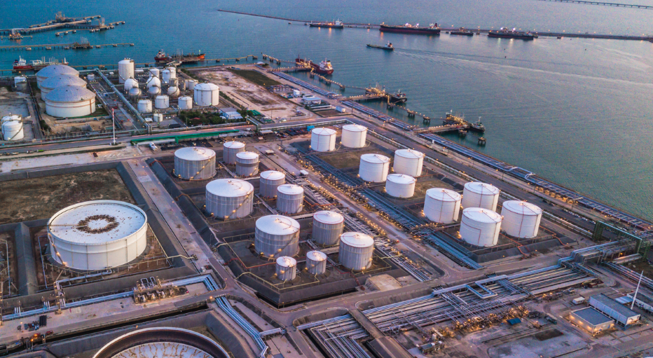 Aerial view of oil terminal, industrial facility for storage of oil and petrochemical products ready for transport to further storage facilities