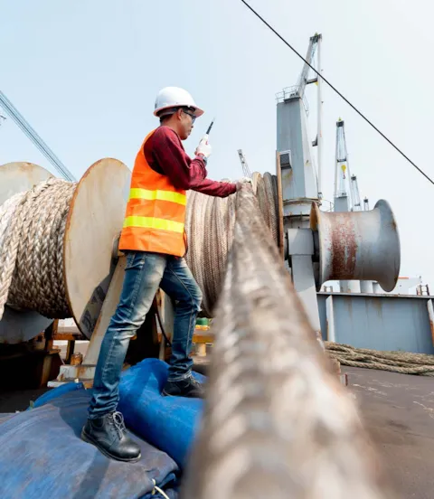crewman supervising mooring operations