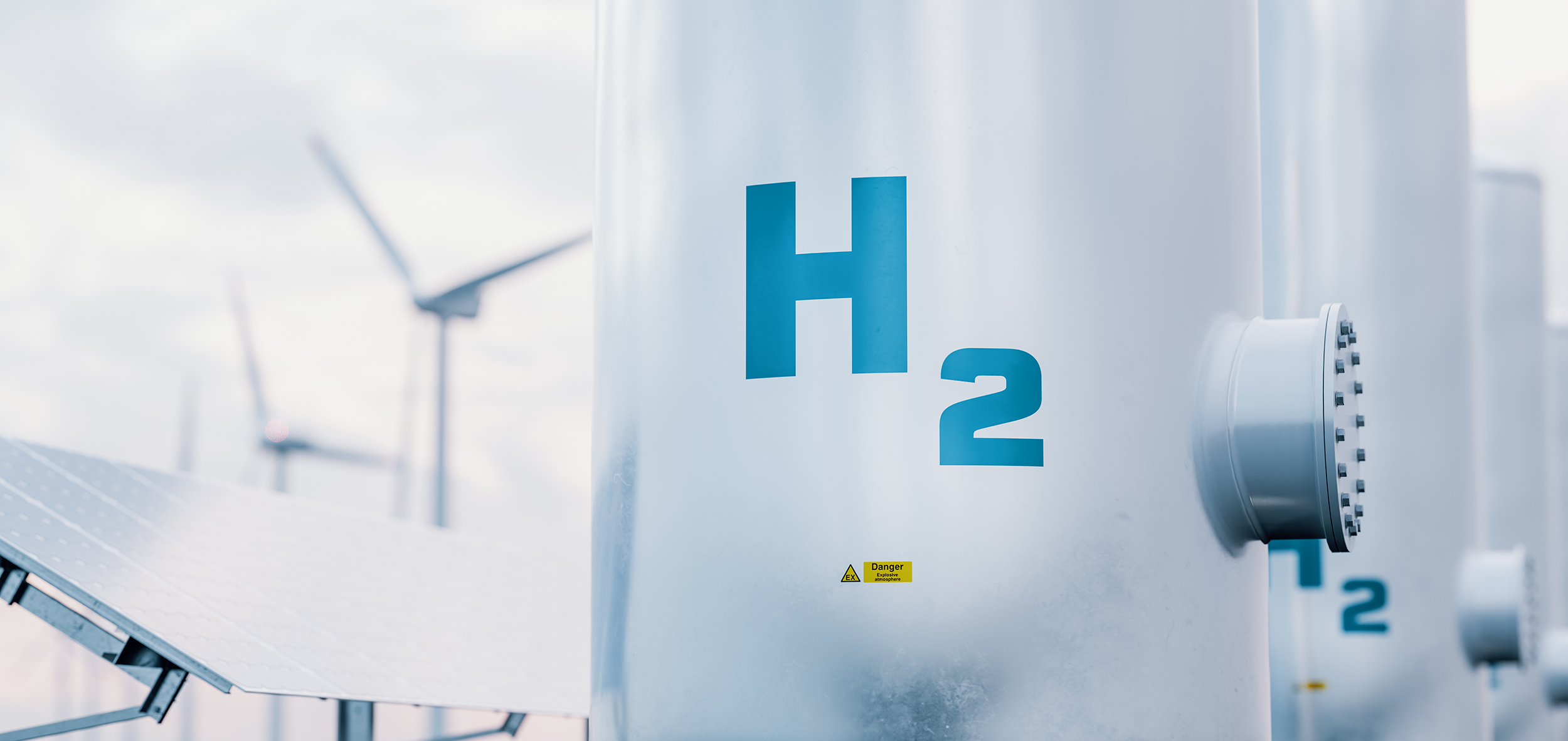 Hydroge energy storage gas tank with solar panels and wind turbines in the background
