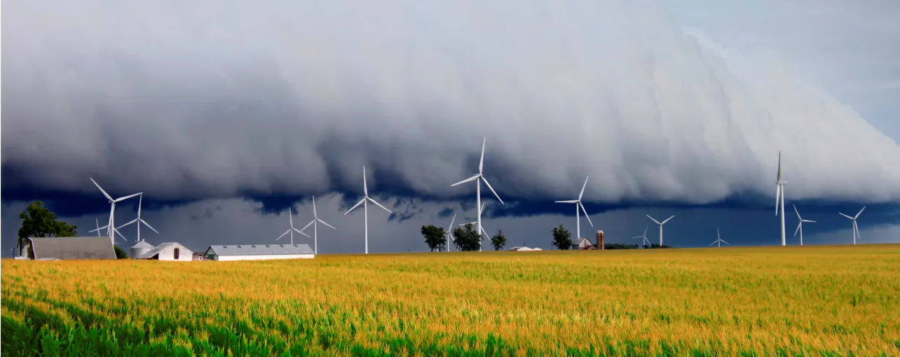 Wind turbines against storm 1288x511