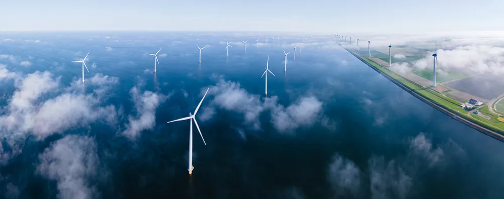 Wind turbines offshore and onshore