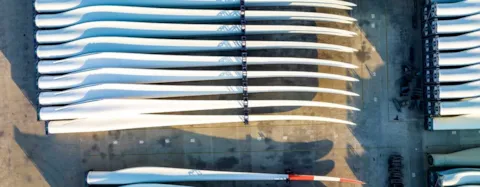 Aerial view of stack of wind turbine blades