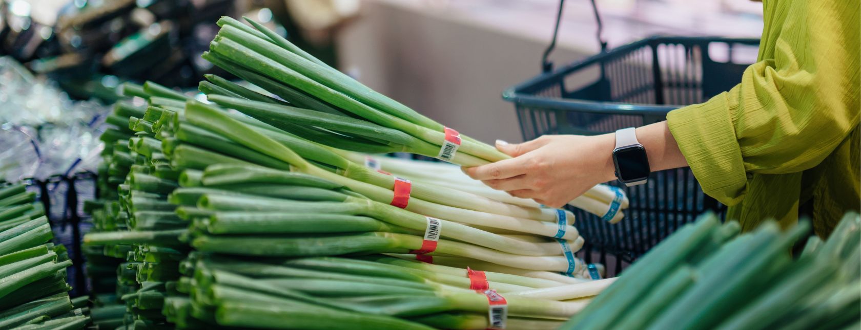 Woman carrying a shopping basket