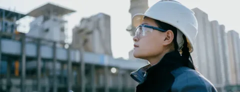 Female engineer auditing in nuclear factory