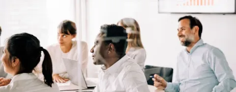 Business people attending a meeting