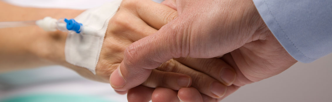 patient and doctor shaking hands