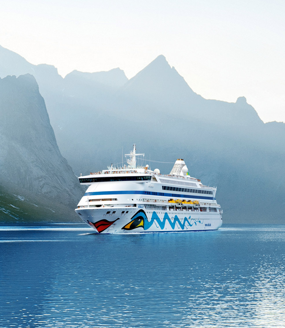 AIDAaura in sailing in a fjord of Norway