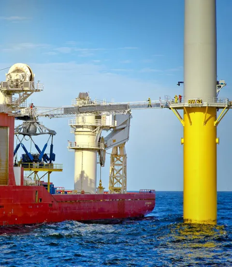 Offshore crew transferring to wind turbine