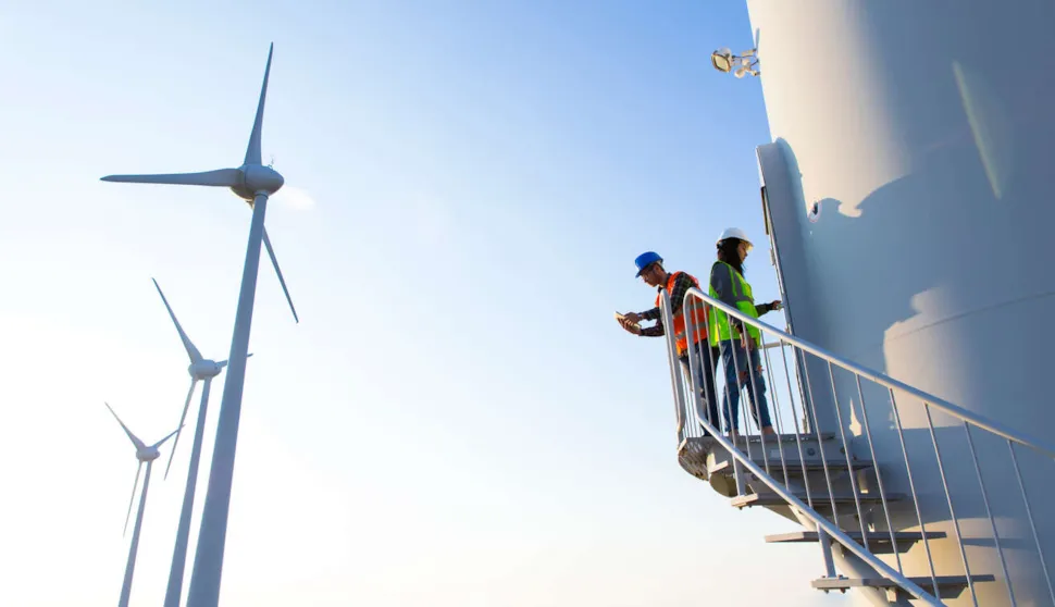 Maintenance engineers working on wind turbine