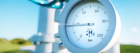 Manometer with a hydrogen pipe in the background