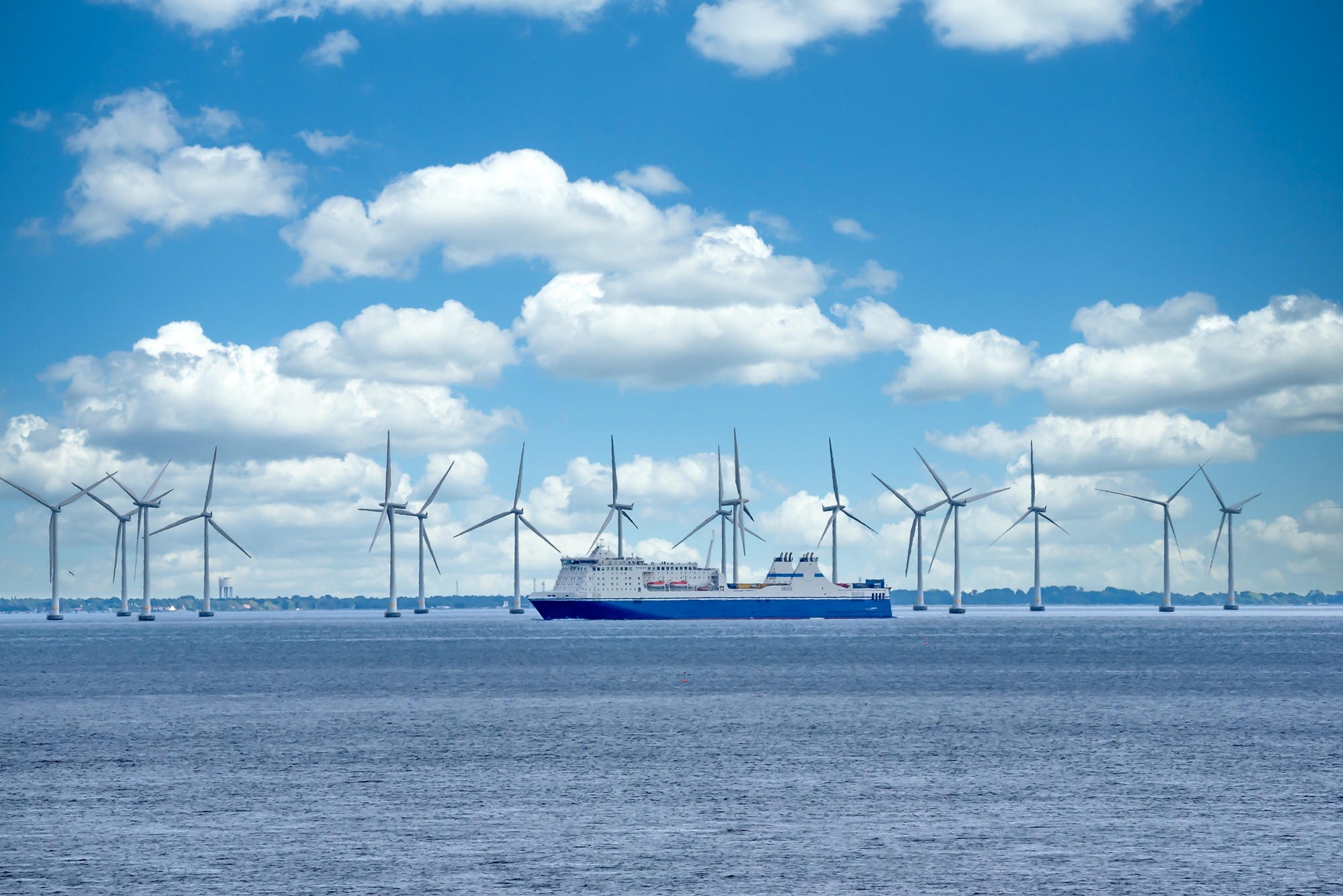 Ferry and wind farm in the bay of Tokyo