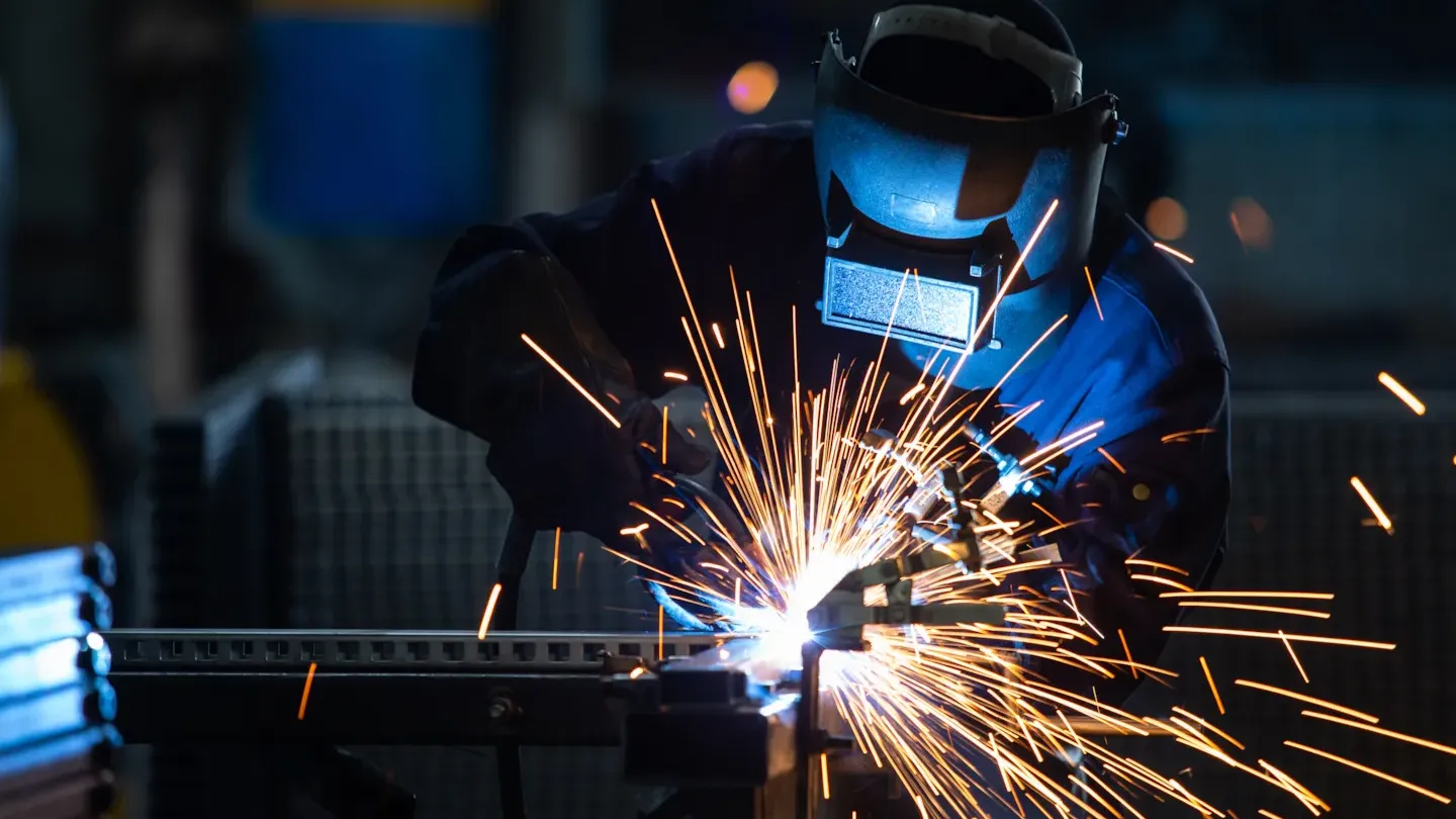 Industrial welder operating equipment