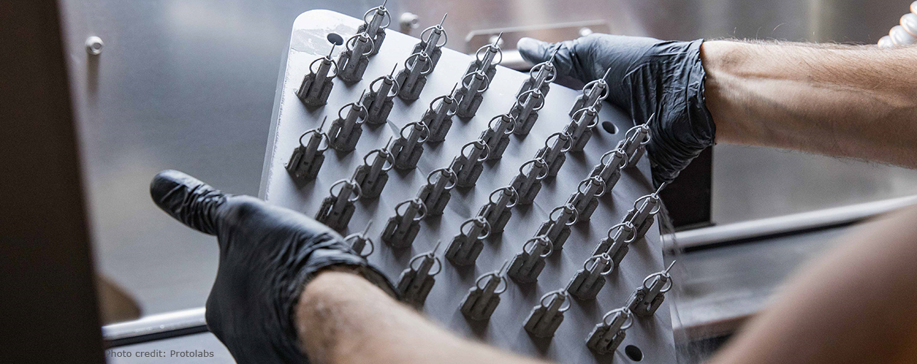 Metal parts being 3D-printed using Protolabs' Direct Metal Laser Sintering (DMLS) additive manufacturing service