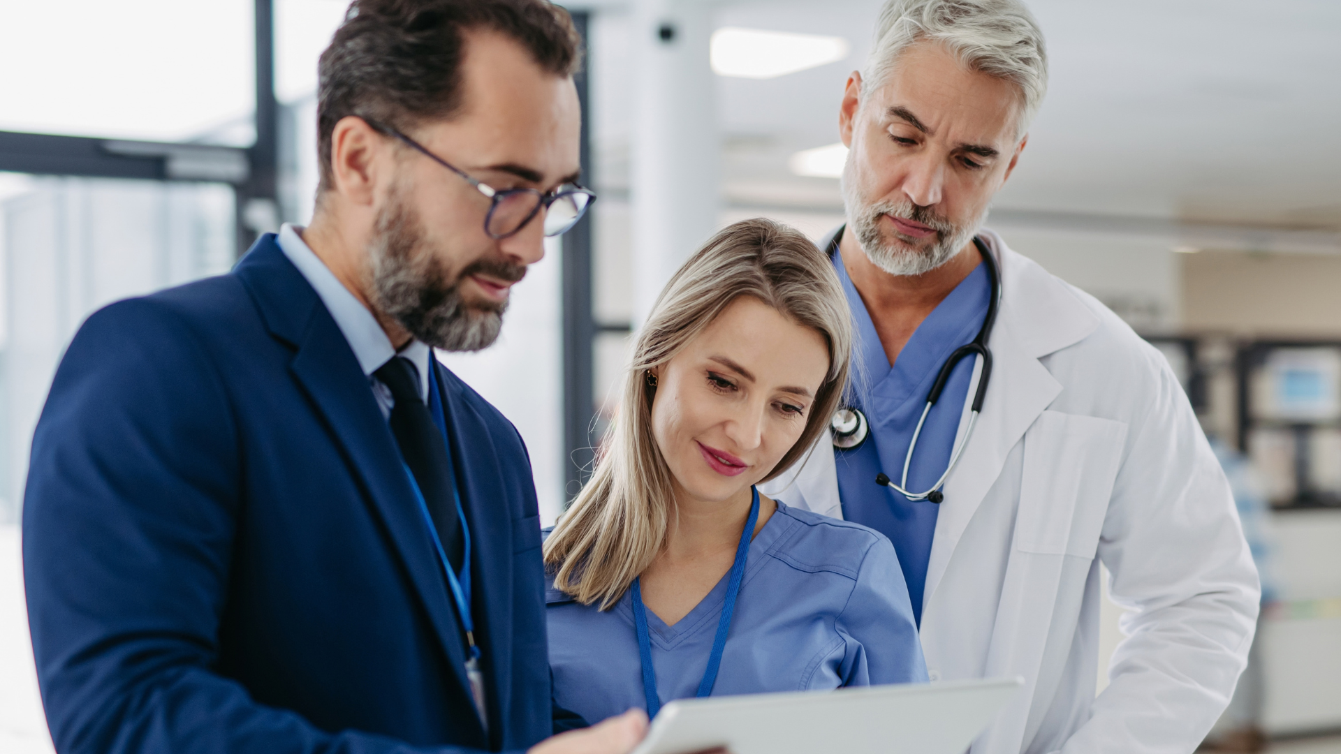 Doctor and nurse with executive