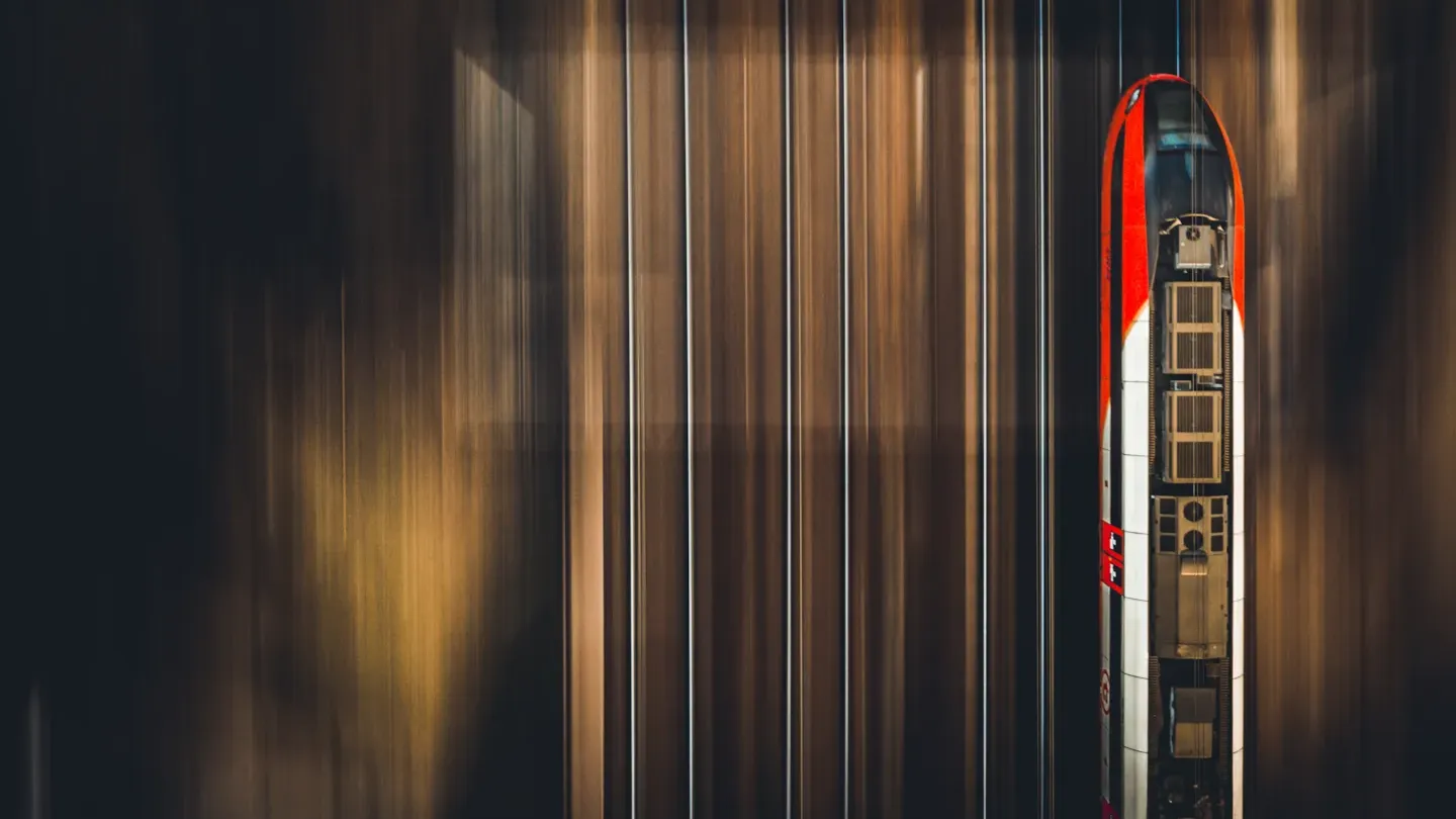 Railway signalling infrastructure with blurred train motion used to illustrate cybersecurity risk mitigation and system resilience