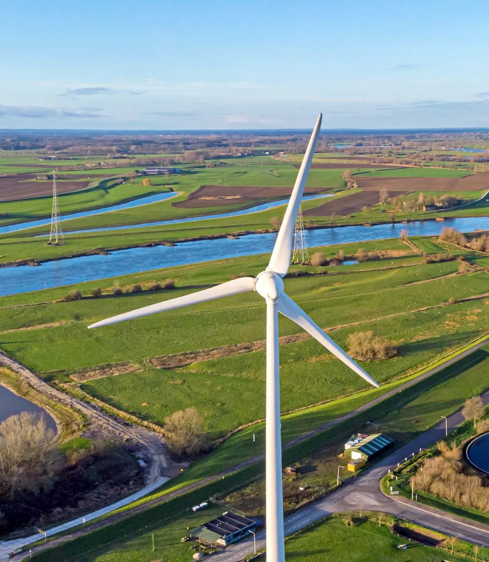wind turbines in green landscape