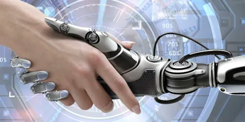 Robot and man handshake