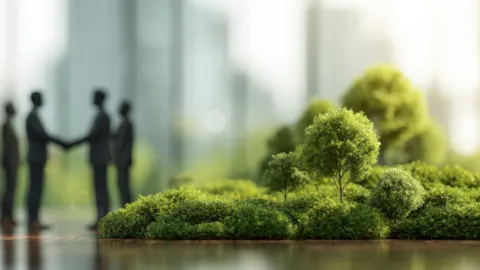 Green sustainable finance concept with seedlings growing inside a glass dome in a corporate finance environment