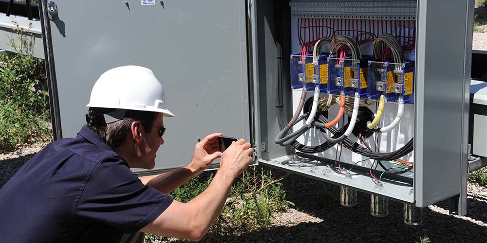 electric grid worker