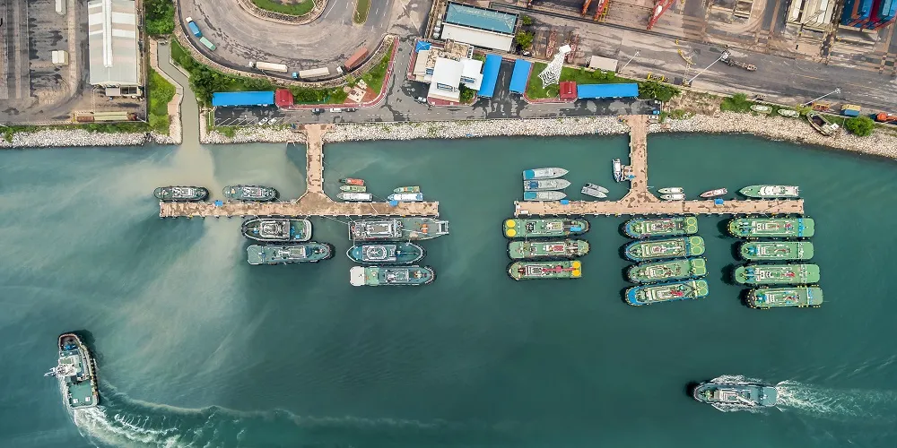TVAS small port of tug boat in shipping yard at sea