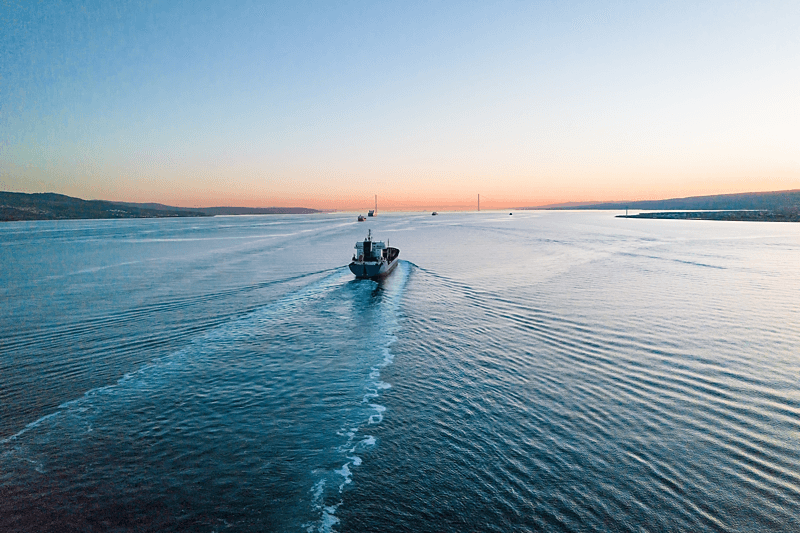 Ship sailing on open water