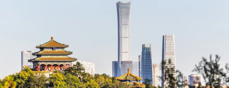 Contrast between the historic Wanchun Pavilion in Jingshan Park in front and the modern CITIC Tower which is the highest building in Beijing
